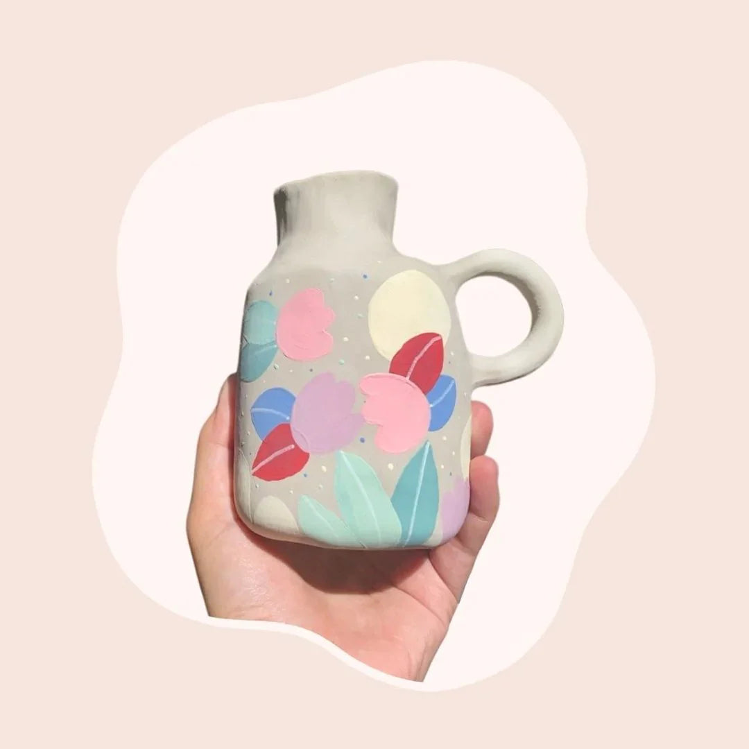 Acrylic painting pens design on a ceramic vase