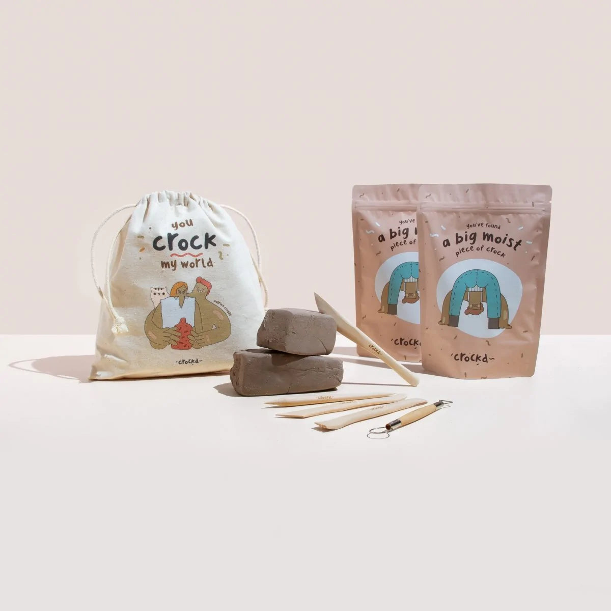 You crock my world tote bag and two moist lumps of crockd clay