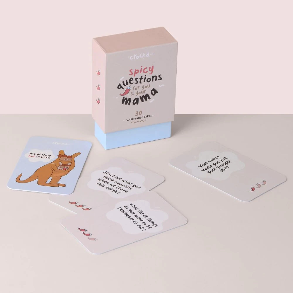 Product shot of spicy conversation cards for adults including box and cards laid out