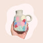 Acrylic painting pens design on a ceramic vase